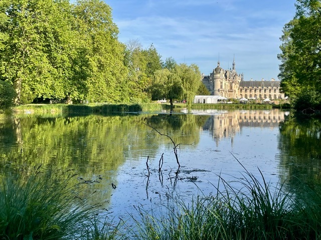 Chantilly Chateau with lake in France