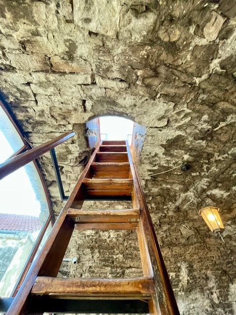 Massimo restaurant - climbing up through the roof to the fortress turret for sunset drinks with a view 