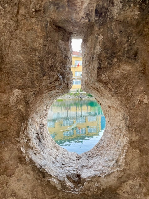 Hole in the wall in Historic Old Town of Kotor, Montenegro