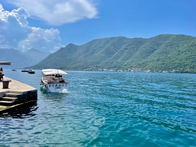 Boats heading to Island of Perast, Montenegro