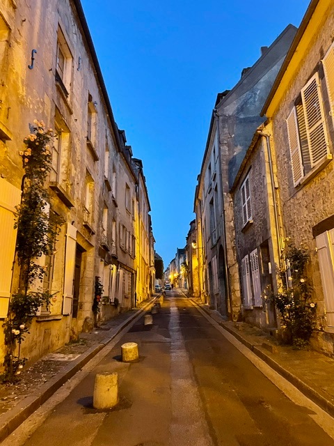 Twilight stroll in historical old town of Senlis, France